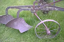 an old iron plow