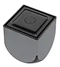 The top of the Ouya contains four hex screws and an indicator LED.[3]