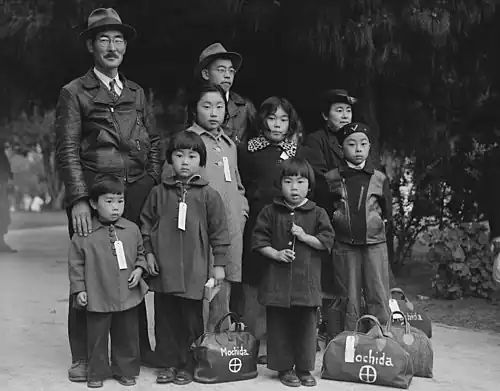 The Mochida's, a normal family, await internment.