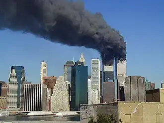 Smoke pouring out of the World Trade Center, stunning New Yorkers, the Nation, and the World.