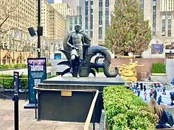 "Youth" bronze sculpture by Paul Manship, on the left top of the stairs leading down to the ice skating rink, designed by Manship to "announce" Prometheus.