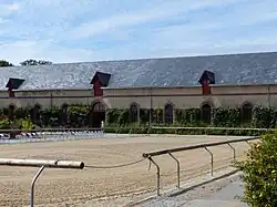 Sand quarry, with stables at the back.