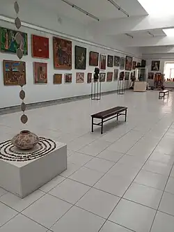 Interior view of the Hall of Khorezm Art in CAMUZ, featuring local artworks