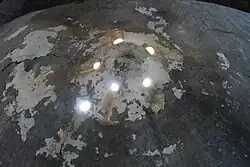 The dome of the bathhouse is equipped with ventilation and lighting vents located at its apex.