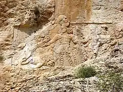Rock relief of Bahram II at Sar Mashhad