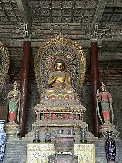 Ming dynasty (1368-1644) statue of Amoghasiddhi in Huayan Temple in Datong, Shanxi, China