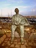 The pastie Supper, sculpture of a man eating a pastie is sited at Bangor Marina.