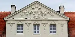 Architectural decorations on the facade of the Łuszczewski Palace