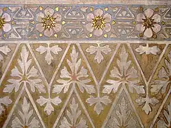 Floral arrangements on the wall.