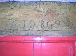 The marriage stone lintel at 'The Hill' farm, Dunlop, East Ayrshire.