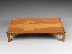 Japanese writing table; early 20th century; lacquered wood with silver fittings and various other materials; height: 12.3 cm, length: 60.96 cm, width: 36.83 cm; Metropolitan Museum of Art (New York City)