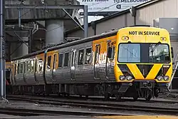 Knorr Comeng in ECOM (yellow & black) livery.