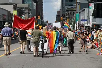 Participants marching down Bank Street in the parade, 2014