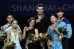 The pairs medalists at the 2015 World Championships