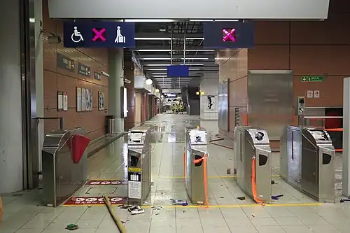 An MTR station vandalised by protesters.