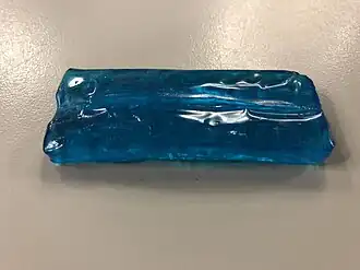 A blue raspberry-flavoured Jolly Rancher Hard Candy Stix after being unwrapped in the Dulles section of Sterling, Loudoun County, Virginia.