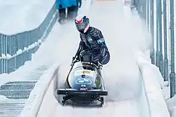Ben Simons bobsleighing with his team consosting of team Lamin Deen, Joel Fearon, and Tremayne Gilling