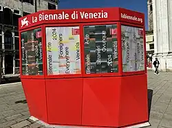 Kiosk with "Foreigners Everywhere" signage for 60th Venice Biennale in 2024