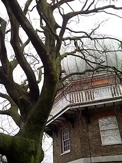 Dome of the Greenwich 28 inch refractor telescope and tree (2015)