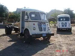 Unrestored (left) 1961 A-series Walk-in Cab truck, (right) 1957 S-series van