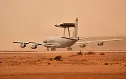 A US Air Force E-3 Sentry deployed to the 363rd Air Expeditionary Wing takes off from Prince Sultan AB during 2003 in support of Operation Iraqi Freedom.