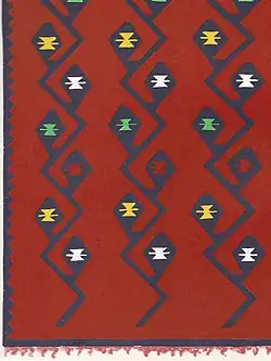 A shaggy carpet with hook designs from Korçë