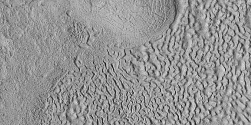 Brain terrain being formed, as seen by HiRISE under HiWish program. Note: this is an enlargement of a previous image using HiView.