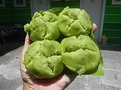 Puto pandan, a type of puto infused with pandan leaves, turning it light green