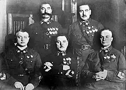 Five men in uniform