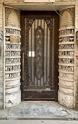 Early - Door of the "Albina" (the Bee) Bank Building (now the "Romanian Waters" National Administration, Strada Edgar Quinet no. 6), Bucharest, unknown architect, 1935[85]