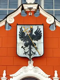 Coat of arms of the city on the facade