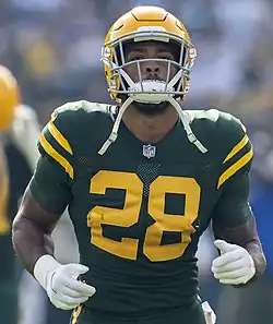 Dillon on a football field wearing his uniform