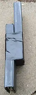 M16 magazines attached with duct tape.