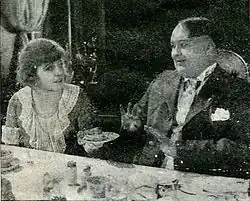 Milly, a cabaret dancer, offers Tim her pie at a theatrical boarding house