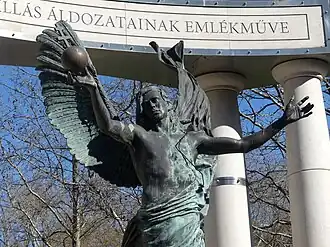 Statue of Archangel Gabriel holding an orb