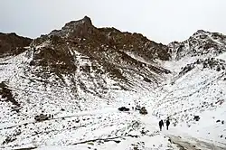 Afghan Local Police and other Afghan National Security Forces drive up a mountain pass in Omna district 2014.