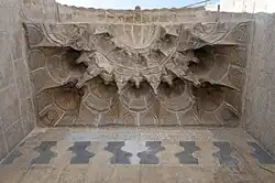 Muqarnas over the entrance of the Tawashi Mosque (1372)