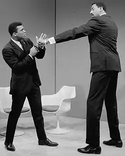 Ali and Chamberlain at a press conference