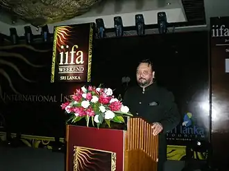 Koch delivers a speech at 11th IIFA Awards
