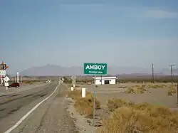 A sign for Amboy on the west side of town