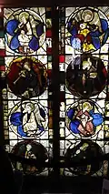 General view of the Angel Musicians stained glass window with the eight music players in individual medallions