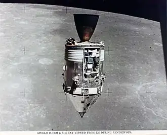 A spacecraft seen with the Moon in background