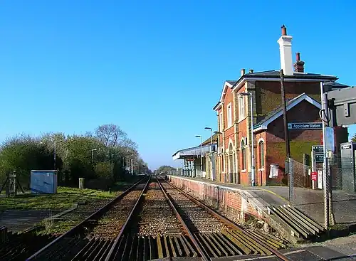 View of a track alongside a station building