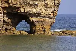 Picture taken in 2006 of a smaller arch which has been carved out of the remaining magnesian limestone stack.