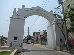 White stone arch on the road