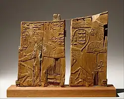 Arm panel from a ceremonial chair of Thutmose IV depicting the king as a sphinx trampling enemies, now in the Metropolitan Museum of Art