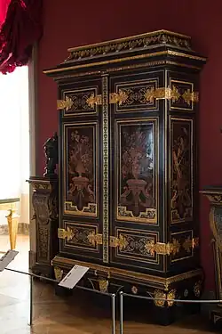 Cupboard; by André Charles Boulle; c.1700; ebony and amaranth veneering, polychrome woods, brass, tin, shell, and horn marquetry on an oak frame, gilt-bronze; 255.5 x 157.5 cm; Louvre[126]
