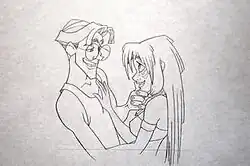 A penciled production sketch showing a man (Milo) on the left embracing a woman (Kida) on the right. A horizontal line is visible on the bottom of the page depicting a reference line for the CinemaScope frame of the drawing.