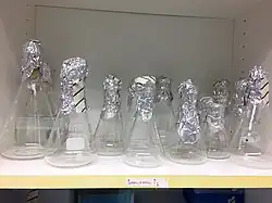 Autoclaved sterile Erlenmeyer flasks covered with aluminium foil