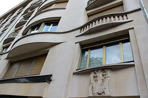 Art Nouveau influences – Sinuous curves on the façade of Avenue Montaigne no. 26, Paris, by Louis Duhayon and Marcel Julien (1937)[53]